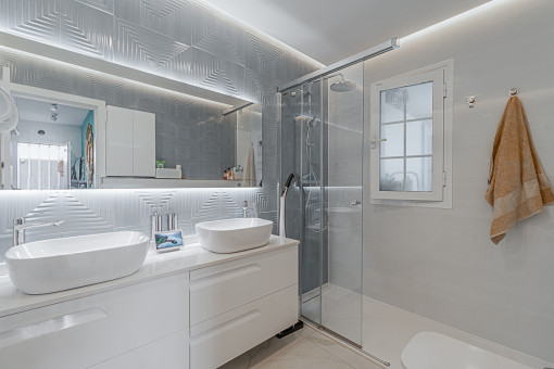 Modern bathroom with walk- in shower