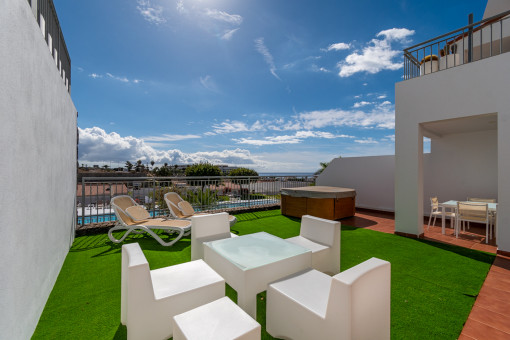 Sunny terrace with seating