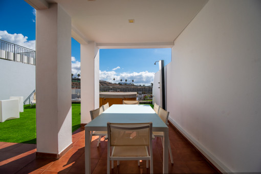 Covered terrace with outdoor dining area